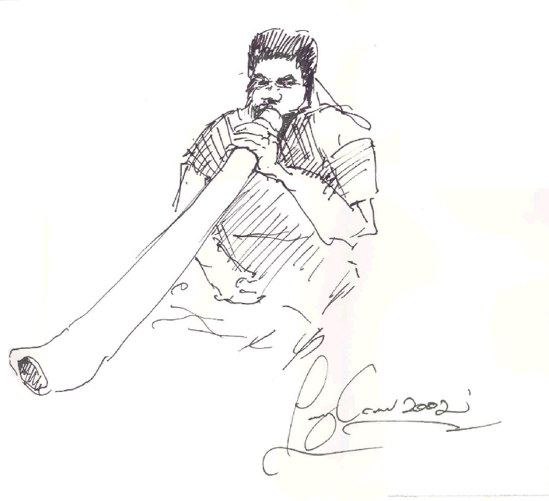 Tommy Crow Playing the Didgeridoo with his Autograph 02-12-23